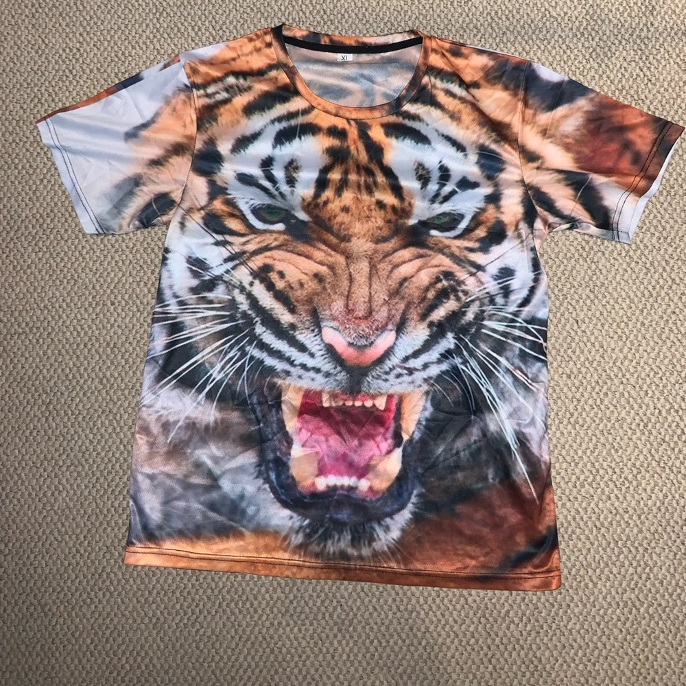 Tiger shirt. It’s a shirt with a huge tiger face on it.